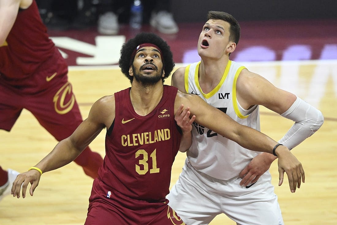 Dec 20, 2023; Cleveland, Ohio, USA; Cleveland Cavaliers center Jarrett Allen (31) and Utah Jazz center Walker Kessler (24) look to rebound in the first quarter at Rocket Mortgage FieldHouse. Mandatory Credit: David Richard-USA TODAY Sports