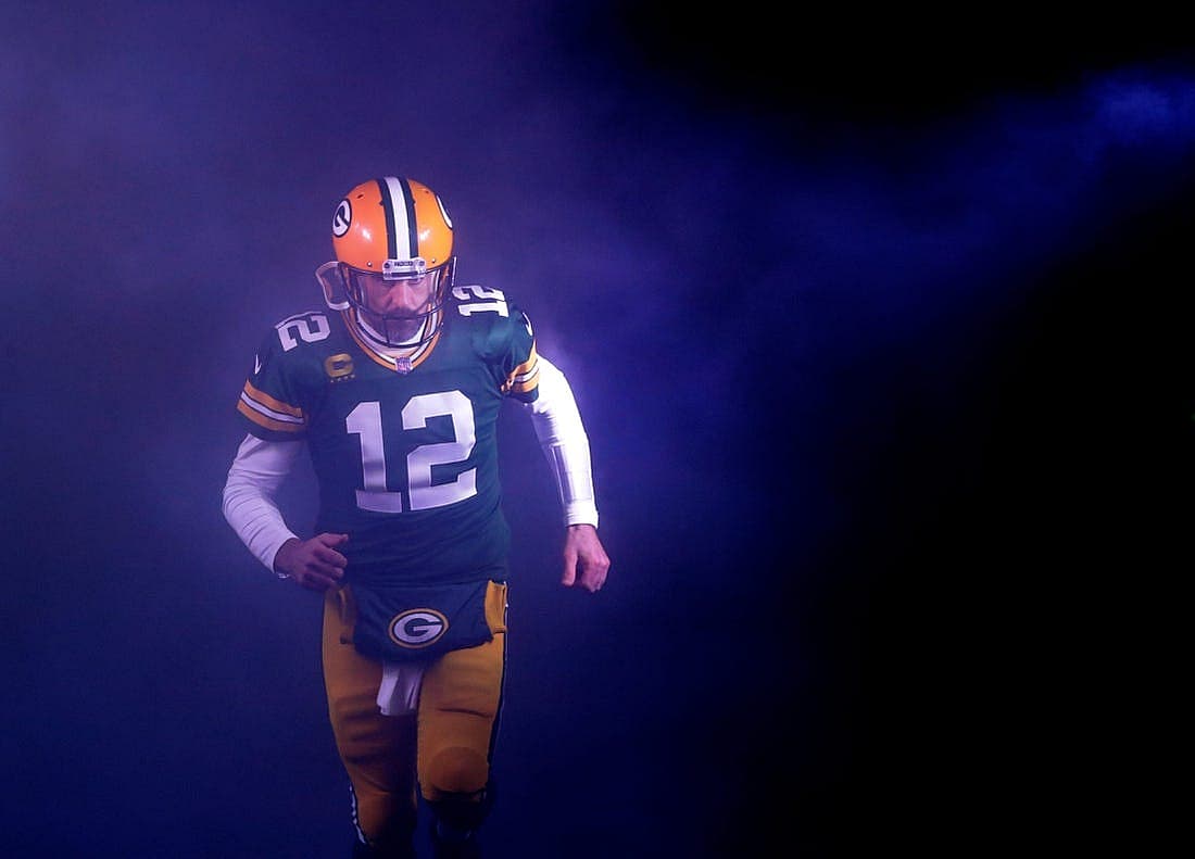 Green Bay Packers quarterback Aaron Rodgers (12) runs out on to the field as he is announced against the Detroit Lions during their football game Sunday, Jan. 8, 2023, at Lambeau Field in Green Bay, Wis.
Apc Packvsdetroit 0108230308djpa