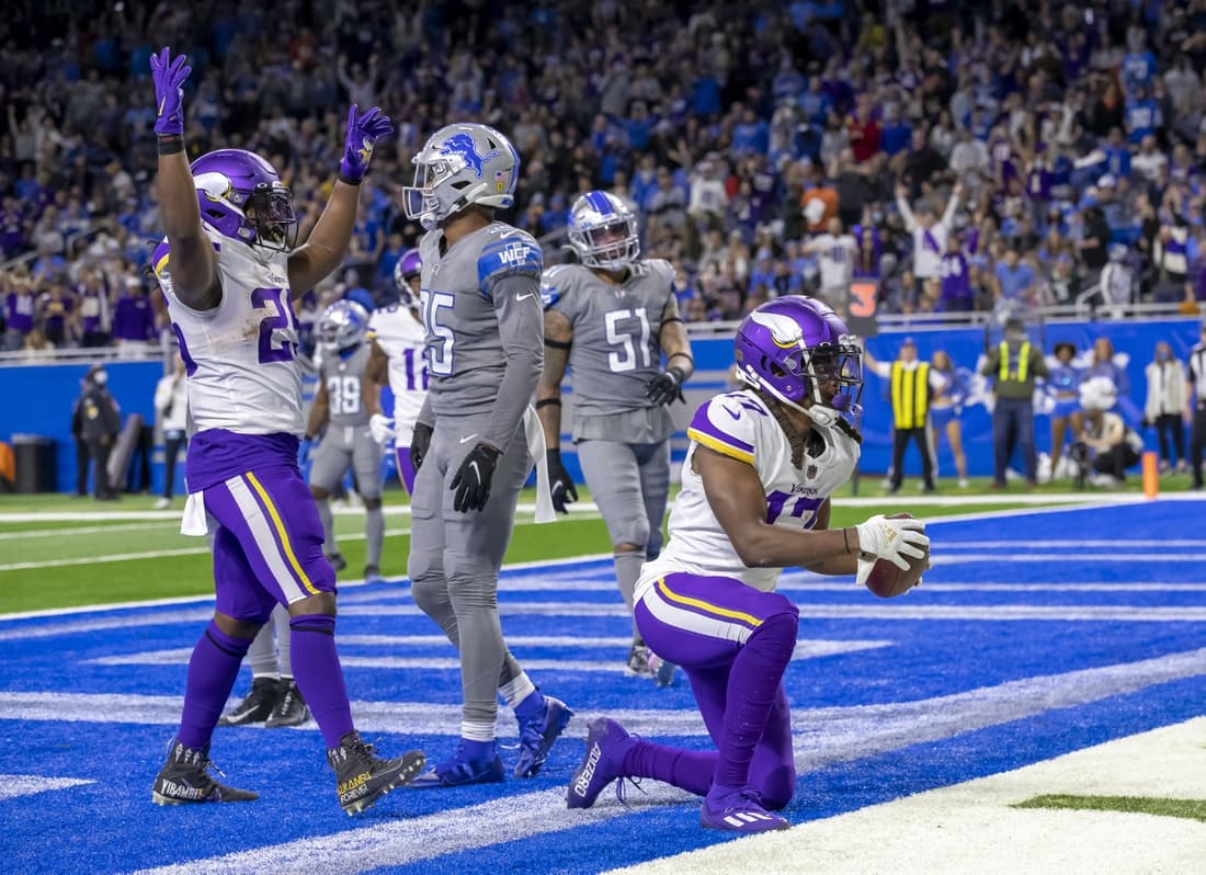 Dec 5, 2021; Detroit, Michigan, USA; Minnesota Vikings wide receiver K.J. Osborn (17) scores a touchdown against the Detroit Lions during the second half at Ford Field. Mandatory Credit: David Reginek-USA TODAY Sports