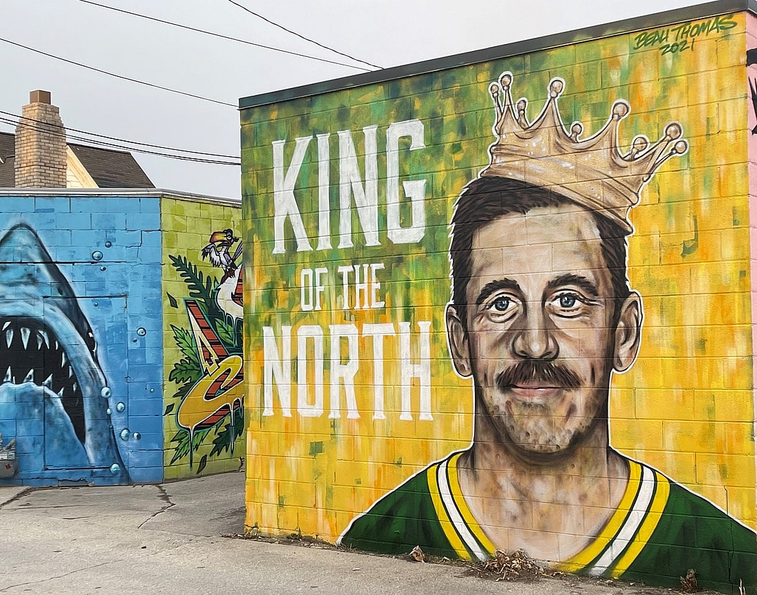 A new mural of Green Bay Packers quarterback Aaron Rodgers by artist Beau Thomas can be found in the alley in the 300 block of South Broadway in Green Bay.

Rodgersmural