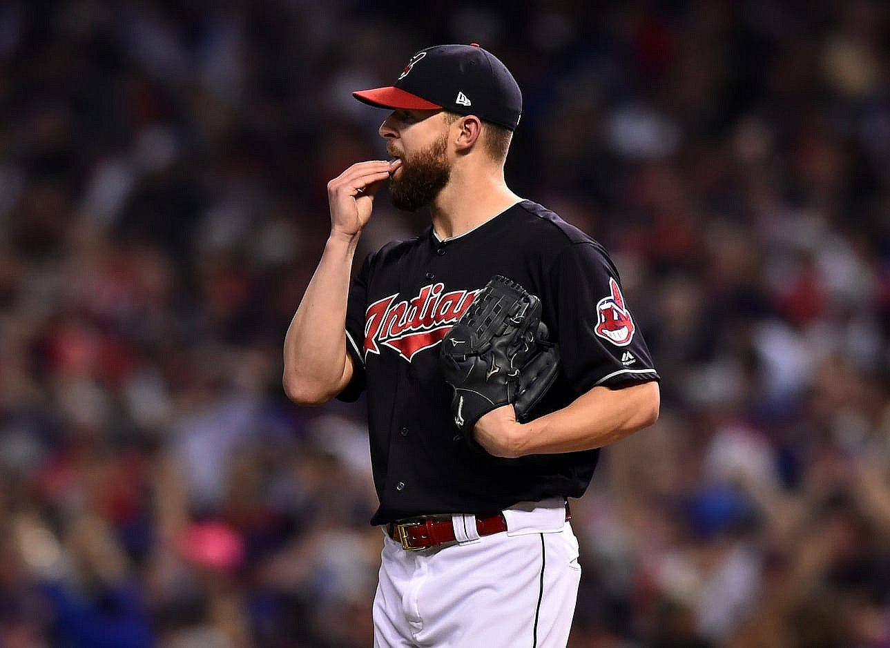 Nov 2, 2016; Cleveland, OH, USA; Cleveland Indians starting pitcher Corey Kluber (28) reacts after giving up a solo home run to Chicago Cubs center fielder Dexter Fowler (not pictured) in the first inning in game seven of the 2016 World Series at Progressive Field. Mandatory Credit: Ken Blaze-USA TODAY Sports