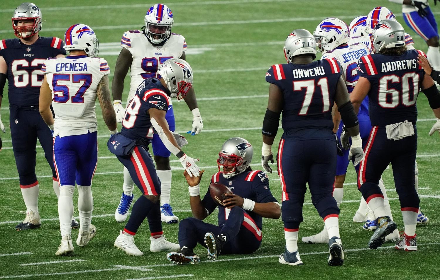 Patriots QB Cam Newton benched after disastrous start.