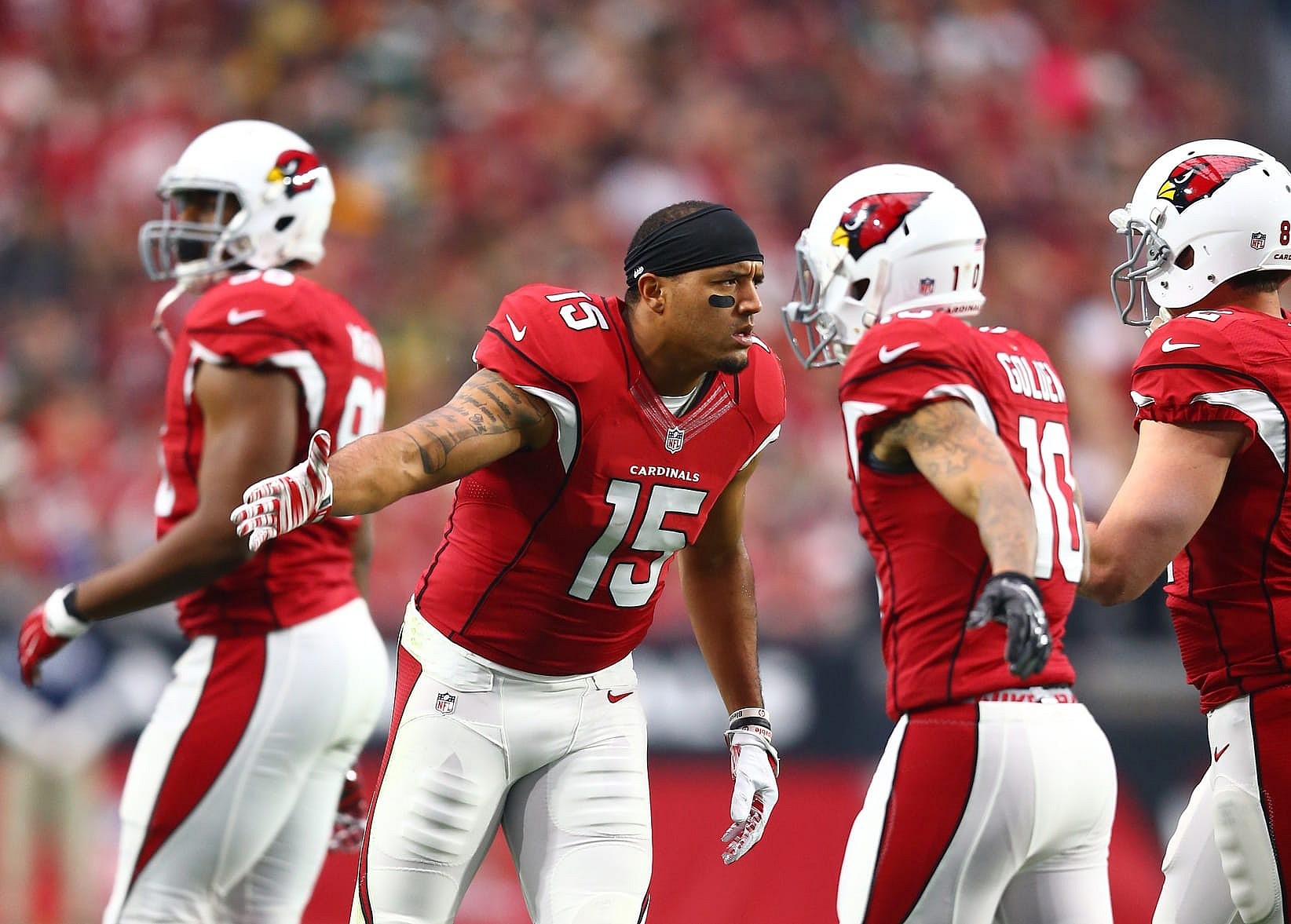  Dec 27, 2015; Glendale, AZ, USA; Arizona Cardinals wide receiver Michael Floyd (15) celebrates a play with teammates against the Green Bay Packers at University of Phoenix Stadium. Mandatory Credit: Mark J. Rebilas-USA TODAY Sports