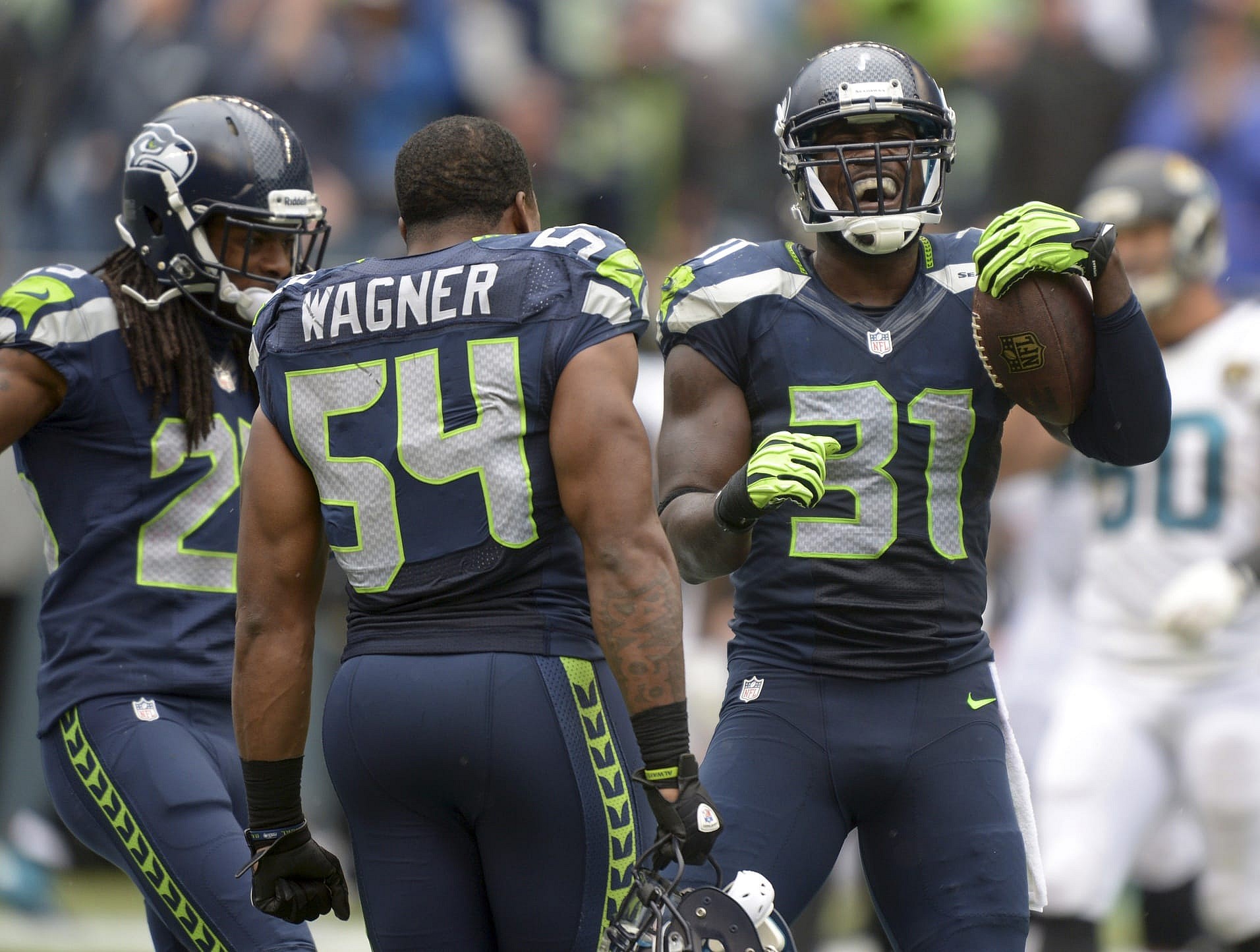 Richard Sherman, Bobby Wagner, Kam Chancellor