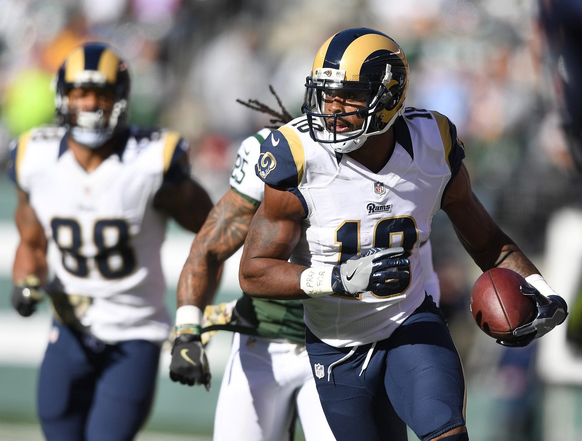 Caption: Nov 13, 2016; East Rutherford, NJ, USA; Los Angeles Rams wide receiver Kenny Britt (18) carries the ball in the first half against the New York Jets at MetLife Stadium. The Rams defeated the Jets 9-6. Mandatory Credit: Kirby Lee-USA TODAY Sports