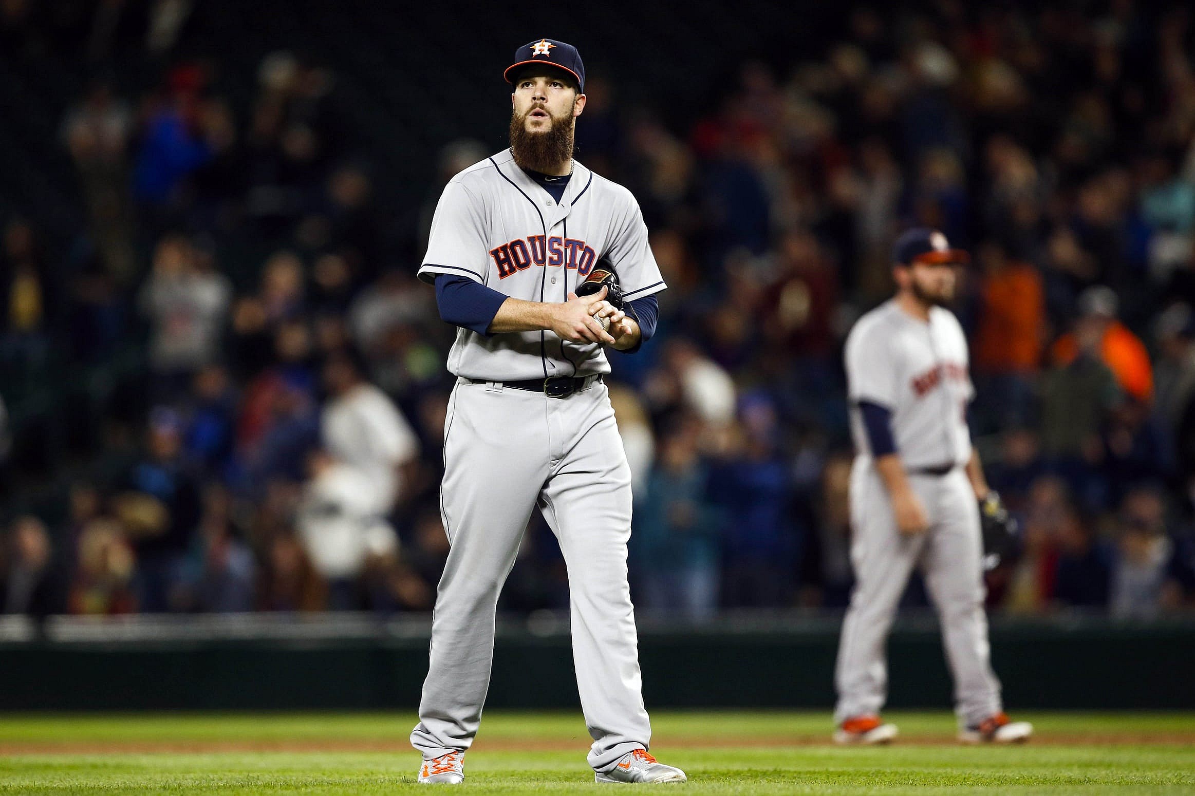 Apr 26, 2016; Seattle, WA, USA; Houston Astros starting pitcher Dallas Keuchel (60) walks back to the mound after surrendering three runs against the Seattle Mariners during the fifth inning at Safeco Field. Mandatory Credit: Joe Nicholson-USA TODAY Sports 