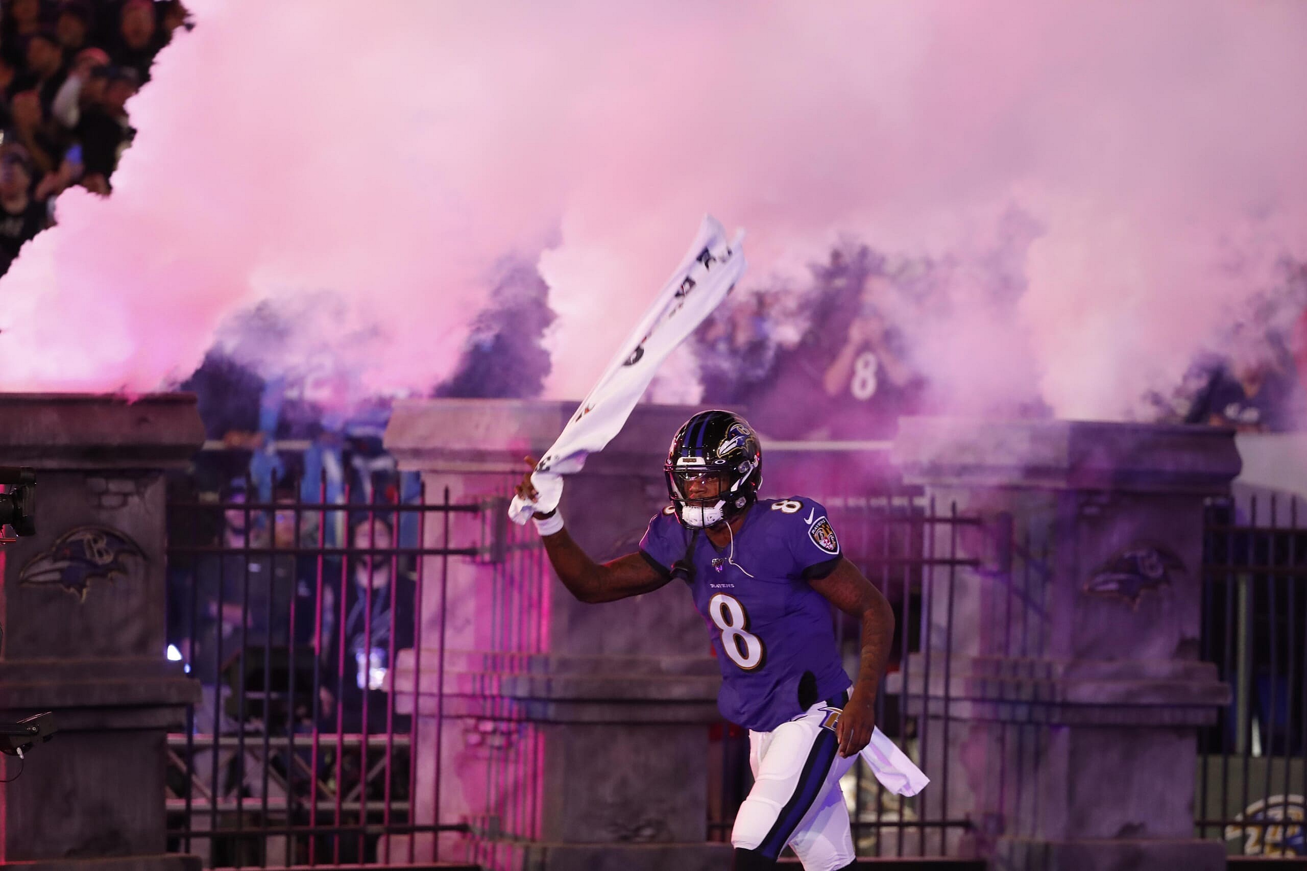 Lamar Jackson of the Baltimore Ravens running out of the tunnel - NFL Week 2