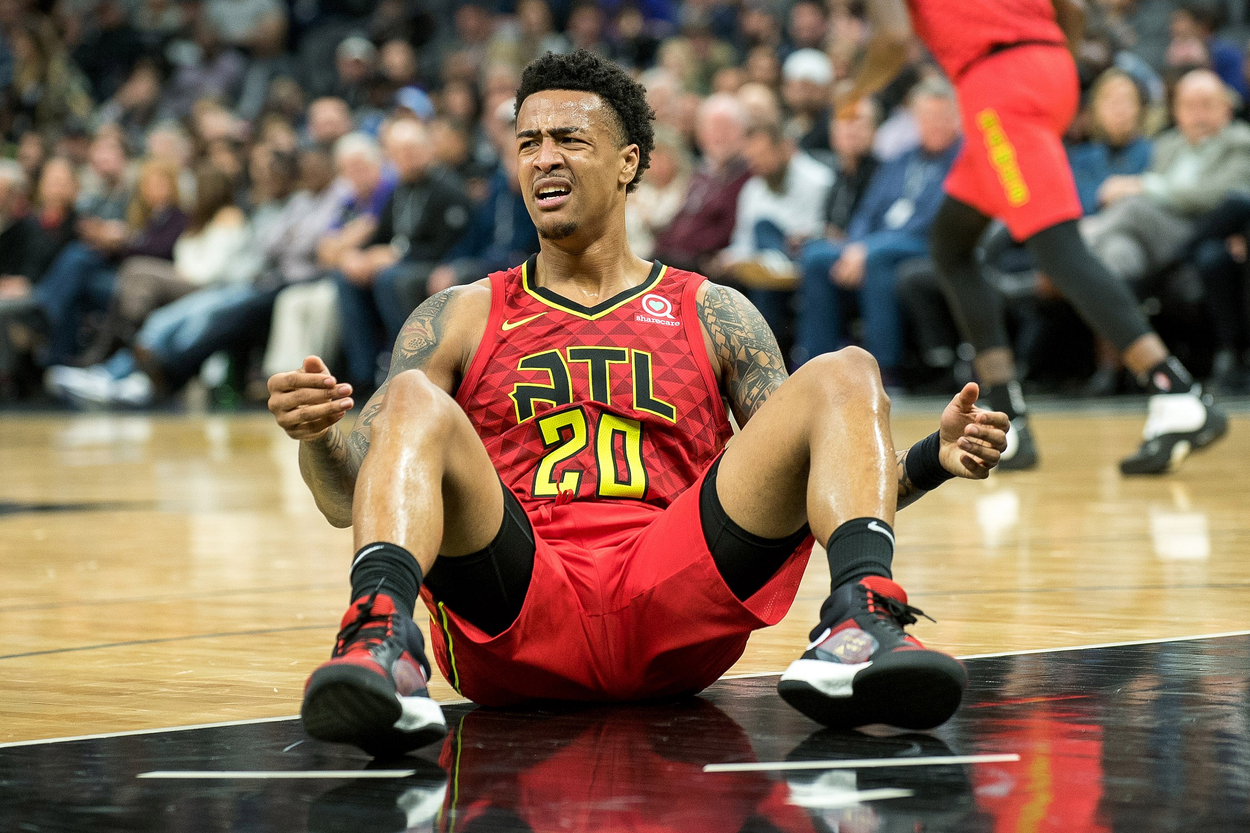 atlanta hawks trade john collins to the sacramento kings