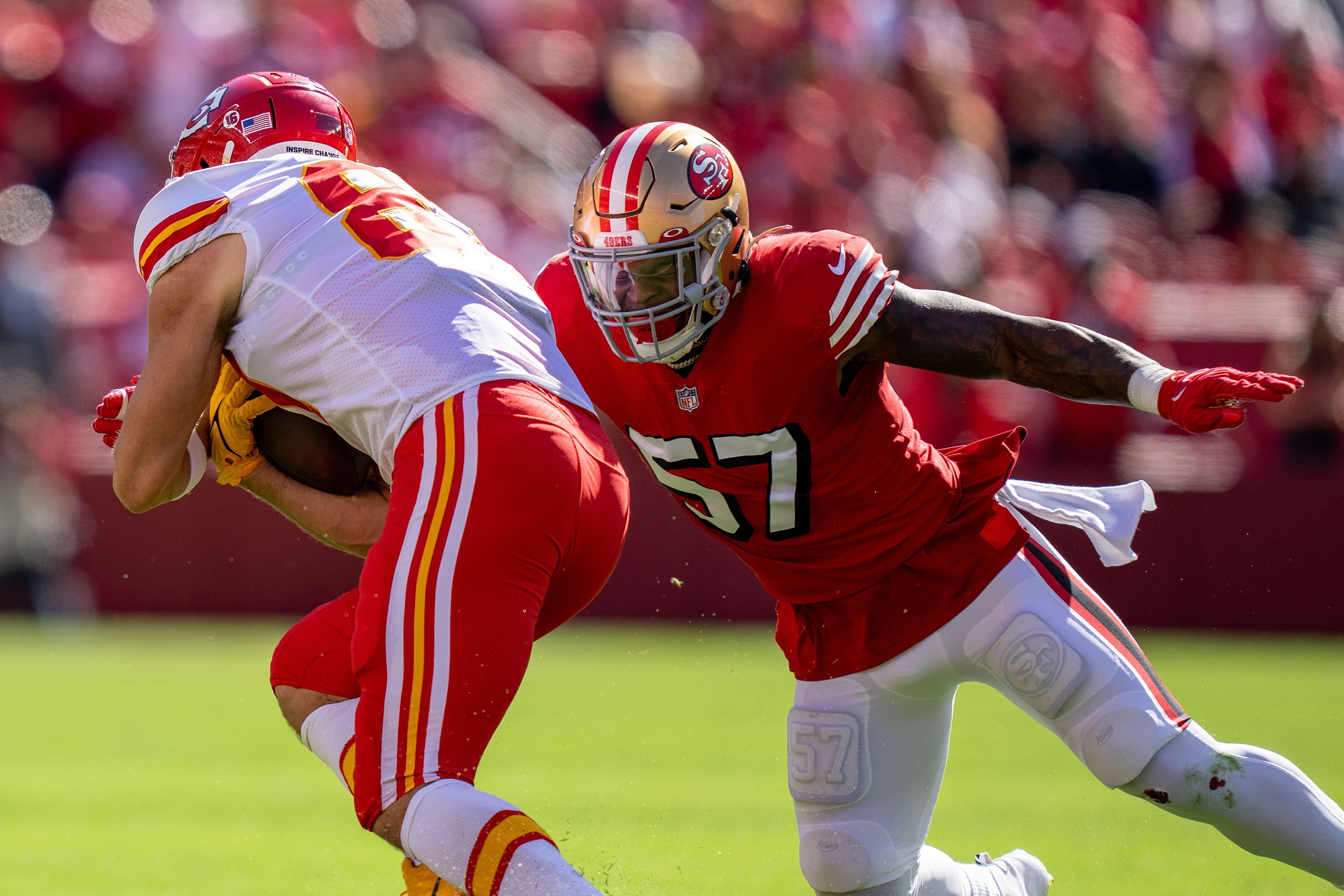 san francisco 49ers' dre greenlaw, fred warner, travis kelce super bowl lviii matchup