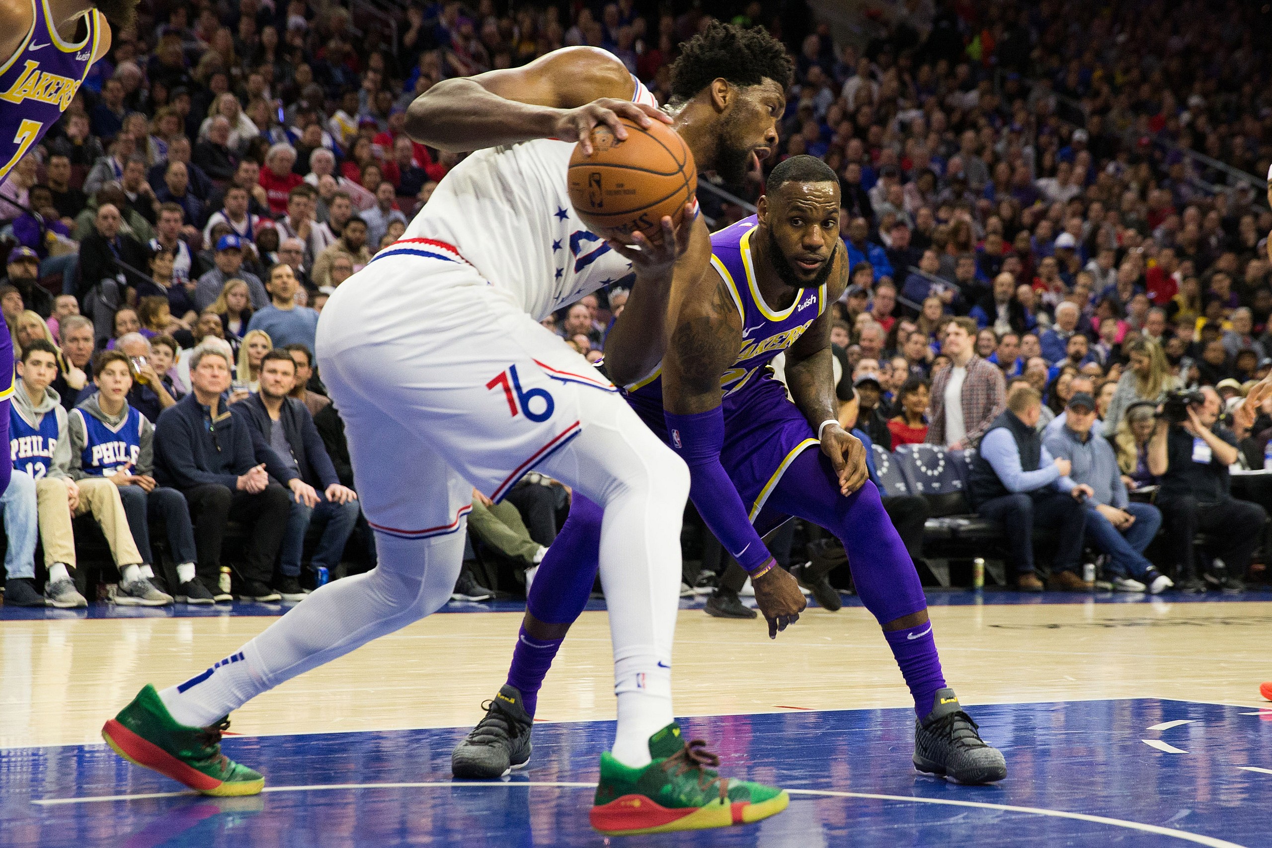 Los Angeles Lakers' LeBron James, Philadelphia 76ers' Joel Embiid