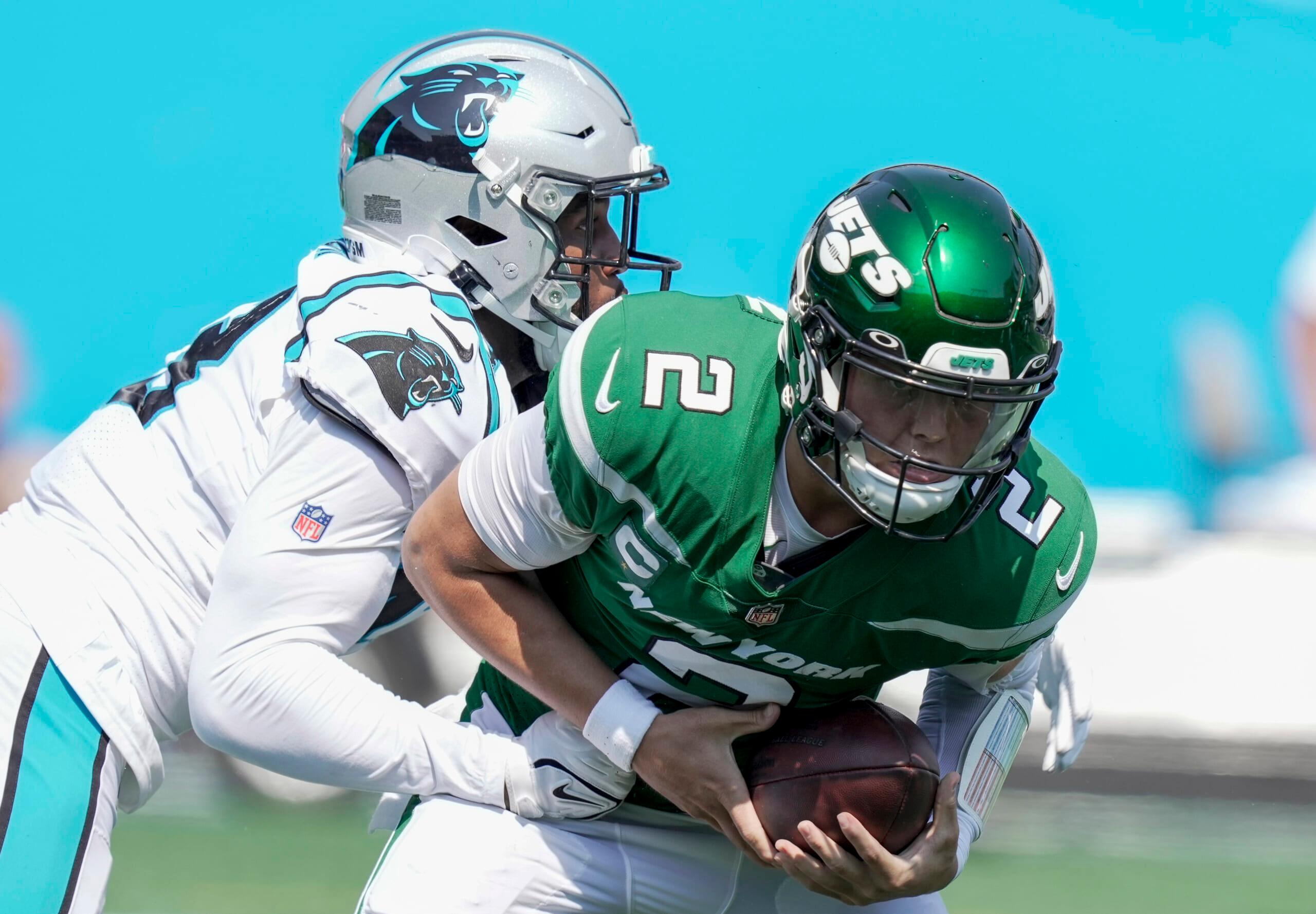 zach wilson struggles, sam darnold growrth
