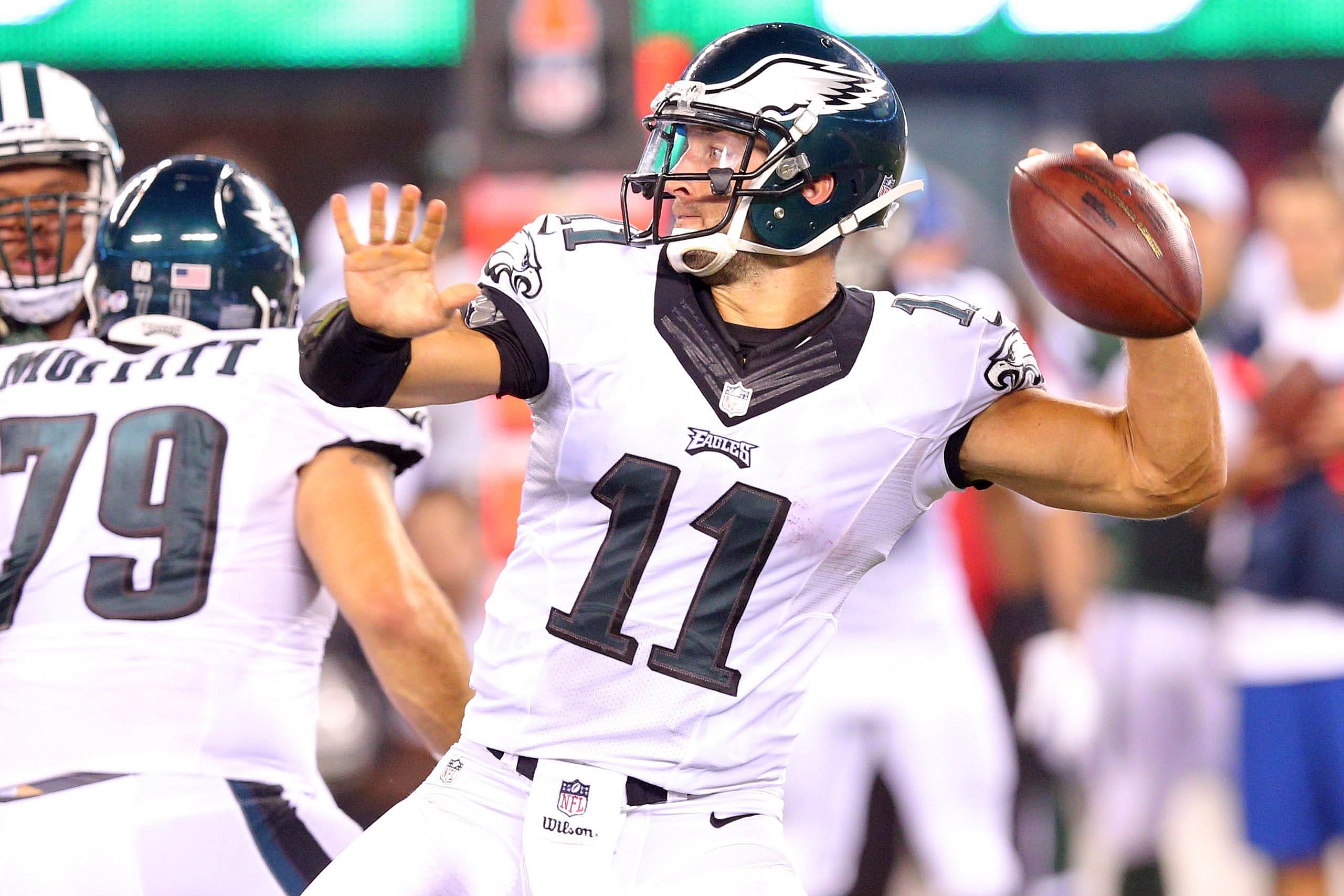 Sep 3, 2015; East Rutherford, NJ, USA; Philadelphia Eagles quarterback Tim Tebow (11) drops back to pass against the New York Jets during the fourth quarter of a preseason game at MetLife Stadium. The Jets defeated the Eagles 24-18. Mandatory Credit: Brad Penner-USA TODAY Sports
