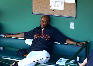 Mar 10, 2014; Scottsdale, AZ, USA; San Francisco Giants former outfielder Barry Bonds in the dugout during the game against the Chicago Cubs at Scottsdale Stadium. Mandatory Credit: Mark J. Rebilas-USA TODAY Sports