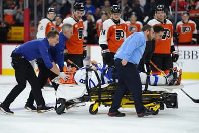 NHL: Chris Tanev taken off ice on stretcher, Toronto Maple Leafs at Philadelphia Flyers
