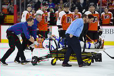 NHL: Chris Tanev taken off ice on stretcher, Toronto Maple Leafs at Philadelphia Flyers