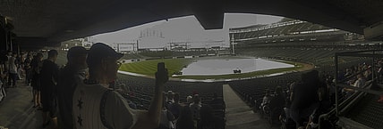 Jun 26, 2021; Chicago, Illinois, USA;  Fans wait out a rain delay before the game between the Chicago White Sox and the Seattle Mariners at Guaranteed Rate Field. Mandatory Credit: Matt Marton-USA TODAY Sports