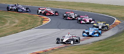 Josef Newgarden (2) leads a pack of cars through turn 1 during the NTT IndyCar Rev Group Grand Prix, Sunday, June 20, 2021, at Elkhart Lake's Road America near Plymouth, Wis.

She 062021 Rev Group Grand Prix Road America Gck 008