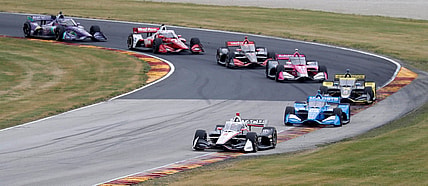Josef Newgarden (2) leads a pack of cars through turn 1 during the NTT IndyCar Rev Group Grand Prix, Sunday, June 20, 2021, at Elkhart Lake's Road America near Plymouth, Wis.

She 062021 Rev Group Grand Prix Road America Gck 008