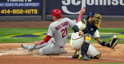 St. Louis Cardinals right fielder Lars Nootbaar (21) beats a show to Milwaukee Brewers center fielder Garrett Mitchell (5) to score on a single by St. Louis Cardinals Paul Goldschmidt during the fifth inning of their game Tuesday, September 27, 2022 at American Family Field in Milwaukee, Wis.

Brewers27 15