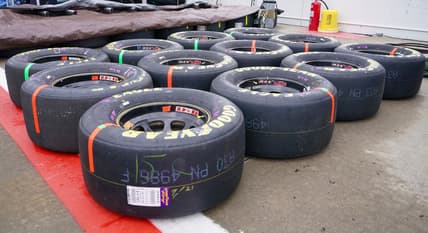 Oct 24, 2021; Kansas City, Kansas, USA; A general view of tires along pit row before the Hollywood Casino 400 at Kansas Speedway. Mandatory Credit: Denny Medley-USA TODAY Sports