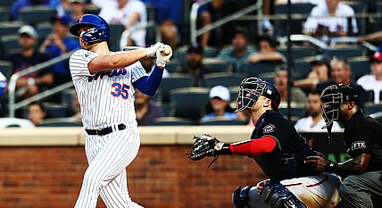 Aug 11, 2021; New York, New York, USA; New York Mets pinch hitter Brandon Drury (35) hits an RBI single against the Washington Nationals during the eighth inning at Citi Field Mandatory Credit: Andy Marlin-USA TODAY Sports