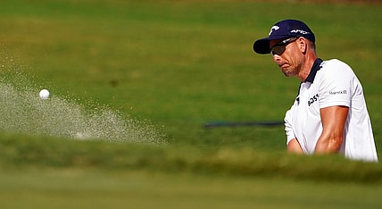 Oct 29, 2022; Miami, Florida, USA; Henrik Stenson plays his shot out of the 17th green side bunker during the second round of the season finale of the LIV Golf series at Trump National Doral. Mandatory Credit: John David Mercer-USA TODAY Sports