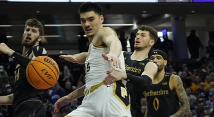 Feb 12, 2023; Evanston, Illinois, USA; Northwestern Wildcats forward Robbie Beran (31) and Purdue Boilermakers center Zach Edey (15) go for the ball during the first half at Welsh-Ryan Arena. Mandatory Credit: David Banks-USA TODAY Sports