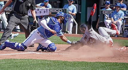 Jul 9, 2022; Kansas City, Missouri, USA; Kansas City Royals catcher MJ Melendez (1) gets the out on Cleveland Guardians right fielder Nolan Jones (33) at home plate in the third inning at Kauffman Stadium. Mandatory Credit: Denny Medley-USA TODAY Sports