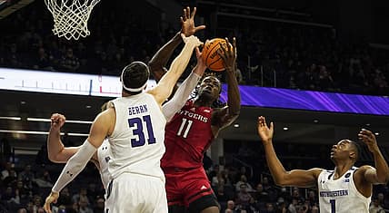 Jan 11, 2023; Evanston, Illinois, USA; Northwestern Wildcats forward Robbie Beran (31) defends Rutgers Scarlet Knights center Clifford Omoruyi (11) during the first half at Welsh-Ryan Arena. Mandatory Credit: David Banks-USA TODAY Sports