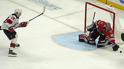 Nov 5, 2023; Chicago, Illinois, USA; Chicago Blackhawks goaltender Arvid Soderblom (40) makes a save on New Jersey Devils right wing Timo Meier (28) during the first period at United Center. Mandatory Credit: David Banks-USA TODAY Sports