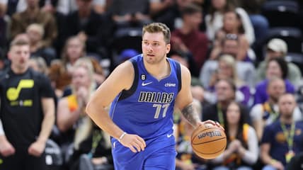 Oct 14, 2022; Salt Lake City, Utah, USA; Dallas Mavericks guard Luka Doncic (77) brings the ball up the court against the Utah Jazz in the second quarter at Vivint Arena. Mandatory Credit: Rob Gray-USA TODAY Sports
