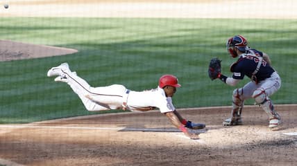 Aug 17, 2023; Washington, District of Columbia, USA; Washington Nationals second baseman Jeter Downs (3) scores a run ahead of a tag by Boston Red Sox catcher Connor Wong (12) on a two run double by Nationals designated hitter Joey Meneses (not pictured) during the fifth inning at Nationals Park. Mandatory Credit: Geoff Burke-USA TODAY Sports