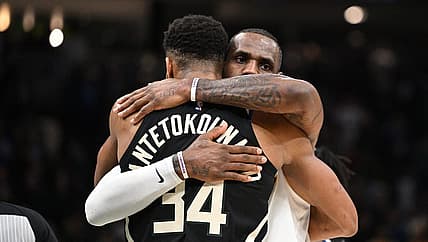 Dec 2, 2022; Milwaukee, Wisconsin, USA; Los Angeles Lakers forward LeBron James (6) and Milwaukee Bucks forward Giannis Antetokounmpo (34) exchange hugs after the Los Angeles Lakers 133-129 win over the Milwaukee Bucks at Fiserv Forum. Mandatory Credit: Michael McLoone-USA TODAY Sports