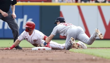 Sep 10, 2023; Cincinnati, Ohio, USA; Cincinnati Reds third baseman Spencer Steer (7) is tagged out at second base against St. Louis Cardinals second baseman Tommy Edman (19) during the second inning at Great American Ball Park. Mandatory Credit: David Kohl-USA TODAY Sports