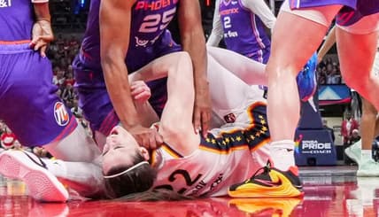 Phoenix Mercury forward Alyssa Thomas (25) scrambles to get up over Indiana Fever guard Caitlin Clark (22) on Wednesday, June