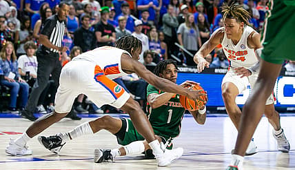 Florida A&M Rattlers guard Byron Smith (1) looks to pass the ball in the first half. The Florida men's basketball team hosted Florida A&M at Exactech Arena at the Stephen C. O'Connell Center in Gainesville, FL on Wednesday, November 30, 2022. The Gators won 102-62 [Doug Engle/Ocala Star Banner]

Gai Ufbasketballfamu
