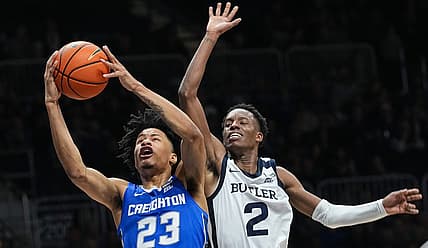 Creighton Bluejays guard Trey Alexander (23) reaches for a lay-up against Butler Bulldogs guard Eric Hunter Jr. (2) on Tuesday, Jan. 17, 2023 on Hinkle Fieldhouse in Indianapolis. Creighton Bluejays leads at the half against the Butler Bulldogs, 36-28.

Ncaa Basketball Ini Butler Basketball Vs Creighton