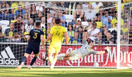 Jun 19, 2022; Nashville, Tennessee, USA; Nashville SC goalkeeper Joe Willis (1) allows a goal to Sporting Kansas City midfielder Felipe Hernandez (not pictured) during the first half at Geodis Park. Mandatory Credit: Christopher Hanewinckel-USA TODAY Sports
