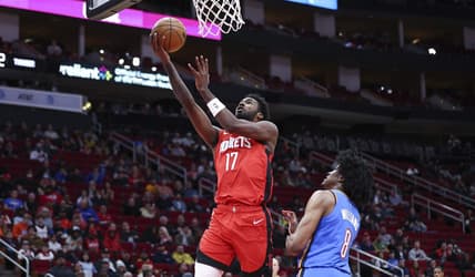 Feb 1, 2023; Houston, Texas, USA; Houston Rockets forward Tari Eason (17) shoots the ball as Oklahoma City Thunder forward Jalen Williams (8) defends during the first quarter at Toyota Center. Mandatory Credit: Troy Taormina-USA TODAY Sports