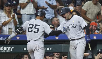Sep 3, 2023; Houston, Texas, USA; New York Yankees second baseman Gleyber Torres (25) celebrates with catcher Austin Wells (88) after hitting a home run during the ninth inning against the Houston Astros at Minute Maid Park. Mandatory Credit: Troy Taormina-USA TODAY Sports