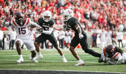 Louisville Cardinals running back Jawhar Jordan (25) runs for a gain against Virginia Tech in the first quarter. Nov.4, 2023.