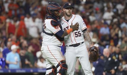 Jul 25, 2023; Houston, Texas, USA; Houston Astros catcher Martin Maldonado (15) celebrates with relief pitcher Ryan Pressly (55) after the game against the Texas Rangers at Minute Maid Park. Mandatory Credit: Troy Taormina-USA TODAY Sports