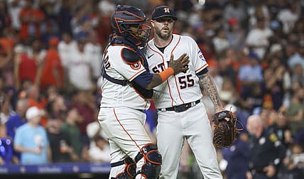 Jul 25, 2023; Houston, Texas, USA; Houston Astros catcher Martin Maldonado (15) celebrates with relief pitcher Ryan Pressly (55) after the game against the Texas Rangers at Minute Maid Park. Mandatory Credit: Troy Taormina-USA TODAY Sports