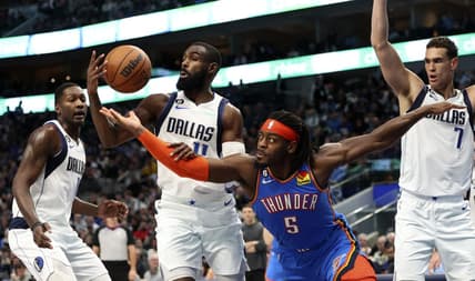 Dec 12, 2022; Dallas, Texas, USA; Oklahoma City Thunder forward Luguentz Dort (5) and Dallas Mavericks forward Tim Hardaway Jr. (11) go for a loose ball during the second quarter at American Airlines Center. Mandatory Credit: Kevin Jairaj-USA TODAY Sports