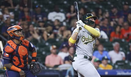 Sep 11, 2023; Houston, Texas, USA; Oakland Athletics first baseman Ryan Noda (49) hits a home run during the ninth inning against the Houston Astros at Minute Maid Park. Mandatory Credit: Troy Taormina-USA TODAY Sports