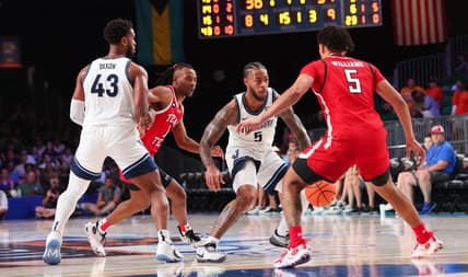 Nov 22, 2023; Paradise Island, BAHAMAS;  Villanova Wildcats guard Justin Moore (5) controls the ball as Texas Tech Red Raiders guard Darrion Williams (5) defends during the first half at Imperial Arena. Mandatory Credit: Kevin Jairaj-USA TODAY Sports