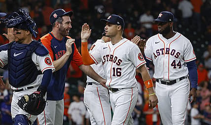 Aug 9, 2022; Houston, Texas, USA; Houston Astros left fielder Aledmys Diaz (16) celebrates with starting pitcher Justin Verlander (35) after the Astros defeated the Texas Rangers at Minute Maid Park. Mandatory Credit: Troy Taormina-USA TODAY Sports