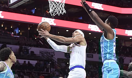 Jan 29, 2024; Charlotte, North Carolina, USA;  New York Knicks guard Josh Hart (3) moves in past Charlotte Hornets forward guard Brandon Miller (24) during the first half at the Spectrum Center. Mandatory Credit: Sam Sharpe-USA TODAY Sports