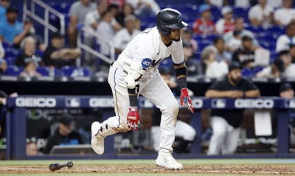 Jun 6, 2023; Miami, Florida, USA; Miami Marlins second baseman Luis Arraez (3) scores on a wild pitch against the Kansas City Royals during the seventh inning at loanDepot Park. Mandatory Credit: Rhona Wise-USA TODAY Sports