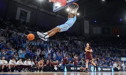 Indiana State Sycamores guard Julian Larry (1) dunks the ball Sunday, March 24, 2024, during the second round of the NIT at the Hulman Center in Terre Haute. The Indiana State Sycamores defeated the Minnesota Golden Gophers, 76-64.